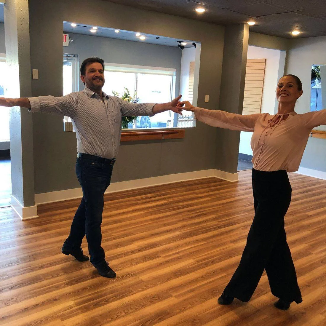 Two partners dancing at the studio