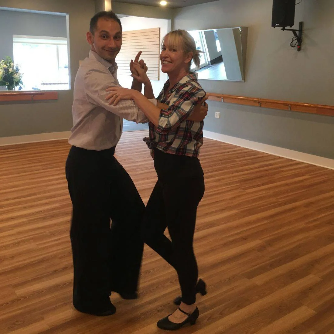 Practicing dance steps with a partner