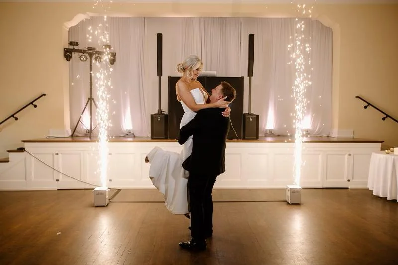 A wedding couple enjoying a dance together